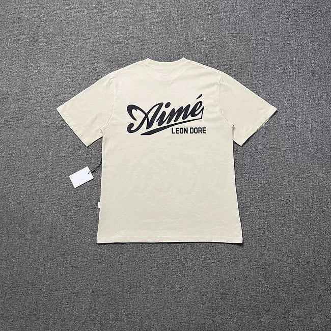 Aimé Leon Dore Script Logo Tee - Cream Hover Image