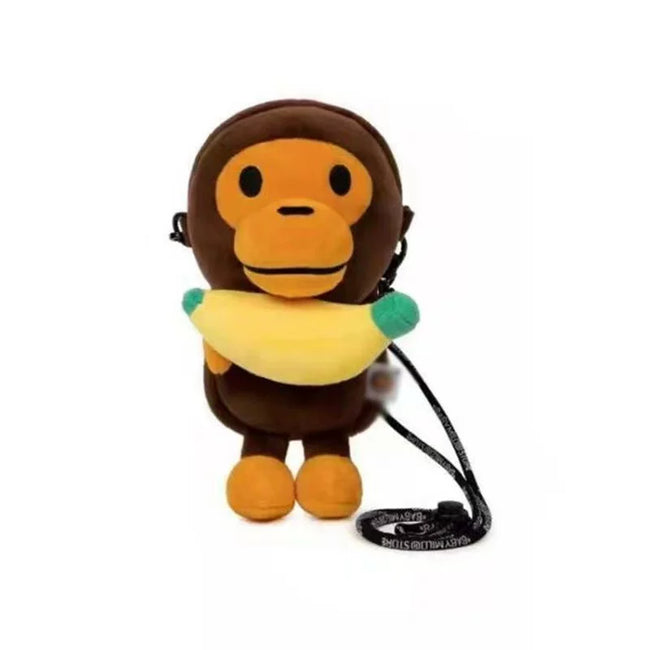 A Bathing Ape Baby Milo Banana Plush Doll Crossbody Bag Hover Image